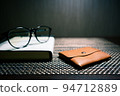leather coin purse and book 94712889