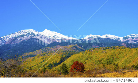 Mt. Norikura and the red maple leaves Mt. Norikura and the red maple leaves 94714903