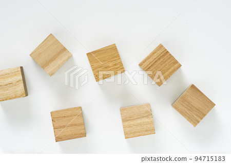 Many wooden cubes white background Many wooden cubes white background 94715183