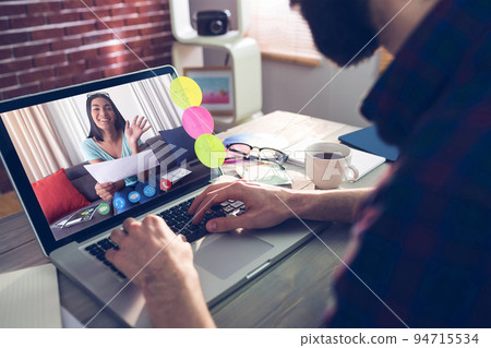 Caucasian businessman sitting at desk using laptop having video call with female colleague 94715534