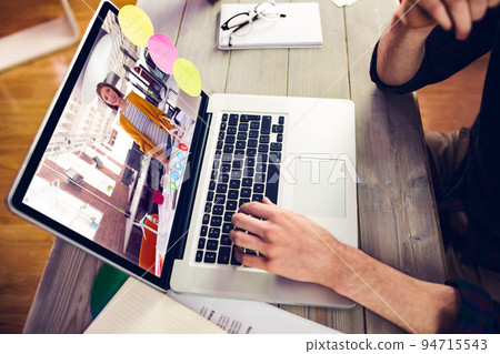 Caucasian businessman sitting at desk using laptop having video call with female colleague 94715543