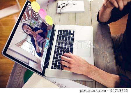 Caucasian man having video call with coworker 94715765