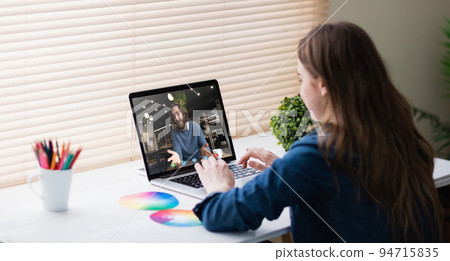 Caucasian girl having video call with caucasian man Caucasian girl having video call with caucasian man 94715835