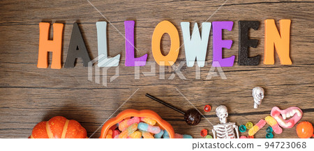 Happy Halloween day with ghost candies, pumpkin, bowl and decorative. Trick or Threat, Hello October, fall autumn, Festive, party and holiday concept Happy Halloween day with ghost candies, pumpkin, bowl and decorative. Trick or Threat, Hello October, fall autumn, Festive, party and holiday concept 94723068