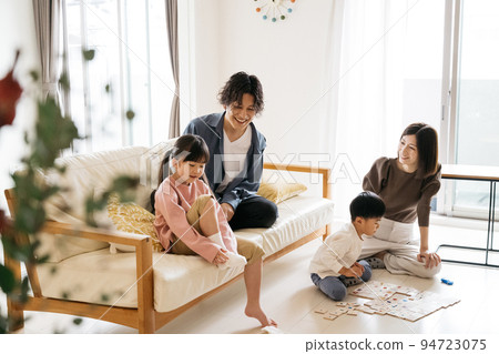 Family image playing in my home living room Family image playing in my home living room 94723075