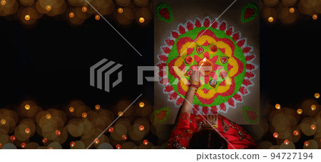 Traditional diya lamps lit during diwali celebration 94727194