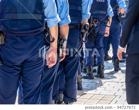 Police officer in charge of security Police officer in charge of security 94727672