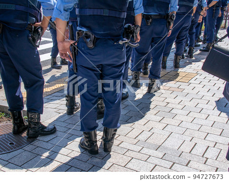 Police officer in charge of security Police officer in charge of security 94727673