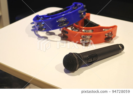 Karaoke room microphone and tambourine 94728059