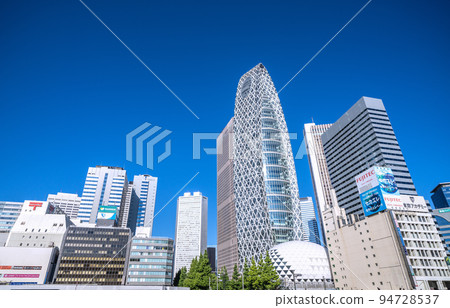 Tokyo cityscape in Japan, overlooking skyscrapers in front of Shinjuku Station Tokyo cityscape in Japan, overlooking skyscrapers in front of Shinjuku Station 94728537