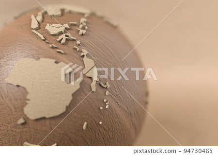 paper earth model on cardboard background 94730485