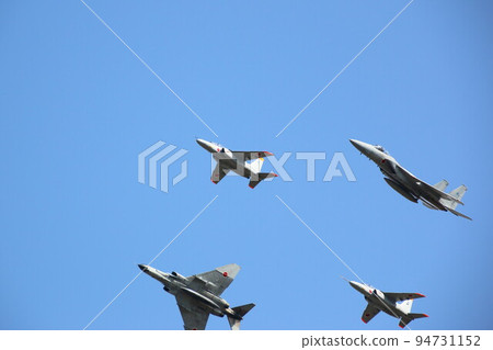 Four fighter planes in formation Four fighter planes in formation 94731152