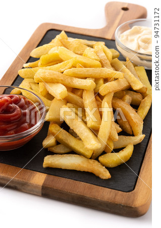 Fried potatoes with ketchup and Mayonnaise 94731172