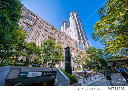 Tokyo cityscape in Japan Shinjuku subcenter, morning commute (mostly from Shinjuku station) scenery. Tochomae Station on the left = September 26 Tokyo cityscape in Japan Shinjuku subcenter, morning commute (mostly from Shinjuku station) scenery. Tochomae Station on the left = September 26 94731392