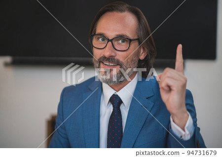 Headshot of a good-looking bearded mature man Headshot of a good-looking bearded mature man 94731679
