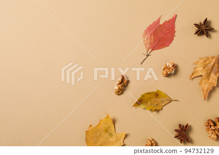 Concept of Autumn, Autumn composition accessories on beige background Concept of Autumn, Autumn composition accessories on beige background 94732129