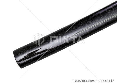 Close up shot of Saya - shiny glossy black scabbard starry style of a Katana - Japanese long Sword isolated in white background. selective focus. 94732412