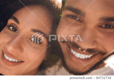 Close up picture of two happy faces Close up picture of two happy faces 94732716