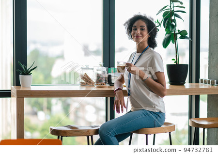 Cute young woman in the office canteen 94732781