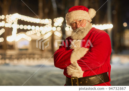Portrait of Cool Santa Claus in Night Street Portrait of Cool Santa Claus in Night Street 94732867
