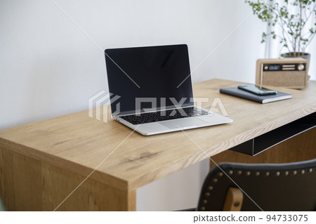 A laptop computer on the desk Work from home image 94733075
