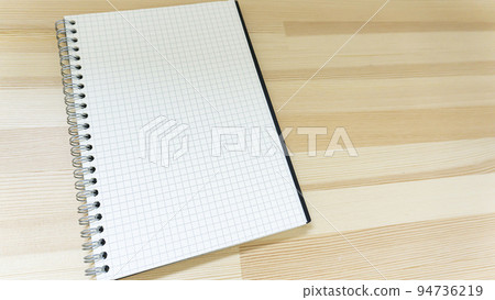 Notebook placed on the desk Notebook placed on the desk 94736219
