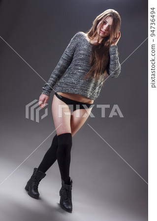 modern style dancer posing on studio background modern style dancer posing on studio background 94736494