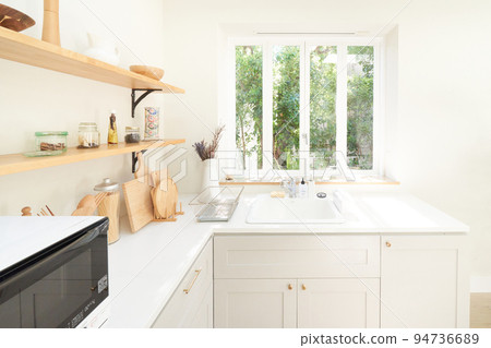 Kitchen sink with bright light Interior image 94736689