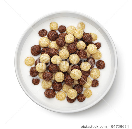 Corn balls mix with milk isolated on white background, top view Corn balls mix with milk isolated on white background, top view 94739654