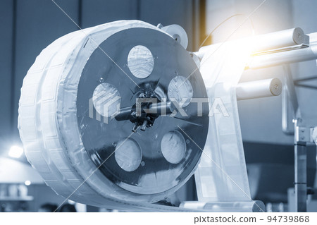 The rolls of plastic bags in the plastics bag extrusion machine. The rolls of plastic bags in the plastics bag extrusion machine. 94739868