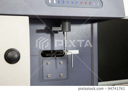 Test tube containing a patient sample loaded on the flow cytometer ready for analysis. Flow cytometer Test tube containing a patient sample loaded on the flow cytometer ready for analysis. Flow cytometer 94741761