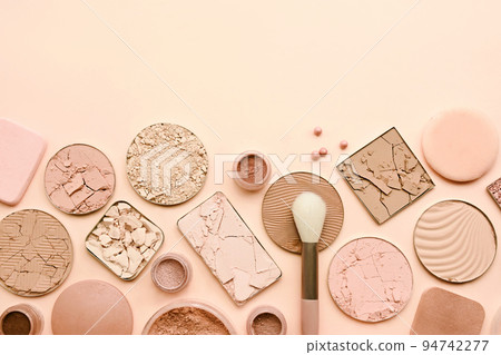 Varieties of face powders and foundations for perfect complexion, basic make up products to even out and matte skin, beauty cosmetics with brushes and sponges, selective focus, toned image Varieties of face powders and foundations for perfect complexion, basic make up products to even out and matte skin, beauty cosmetics with brushes and sponges, selective focus, toned image 94742277