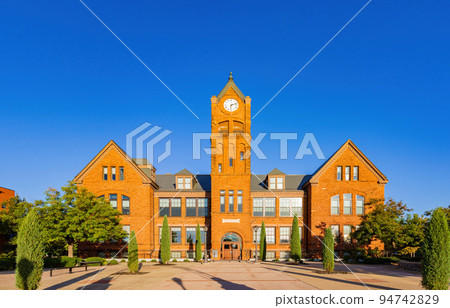 Sunny view of the Old North Tower of University of Central Oklahoma 94742829
