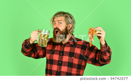 Best party here. bachelor men club. Having fun and drink in bar. nice pub menu. man watching football while drinking beer and eating pizza. eating pizza and drinking. take-away pizza 94742877