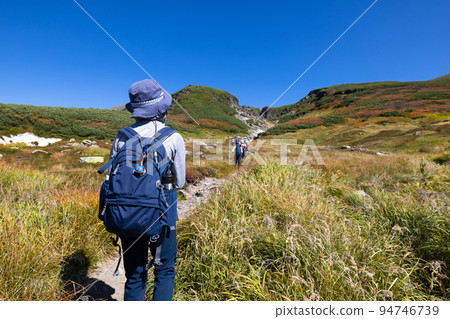 Child climbing Daisetsuzan Mt. Nakadake Child climbing Daisetsuzan Mt. Nakadake 94746739