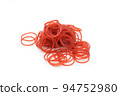 Red rubber band isolated on white background. 94752980