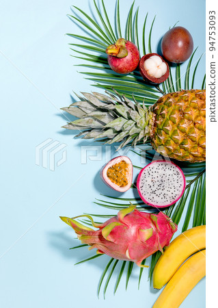 Tropical Fruits_Pineapple, dragon fruit, mangosteen, banana,tropical leaves 94753093