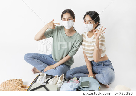 preparing for a summer trip concept series_korean beautiful asian young women wearing mask 94753386