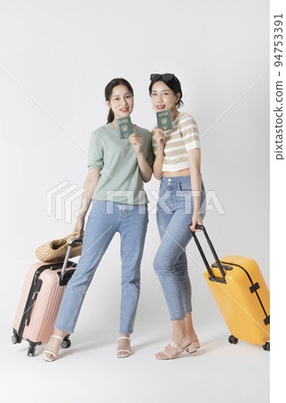 preparing for a summer trip concept series_korean beautiful asian young women holding passport preparing for a summer trip concept series_korean beautiful asian young women holding passport 94753391