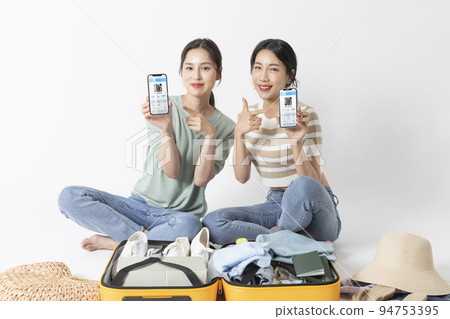 preparing for a summer trip concept series_korean beautiful asian young women mobile passport preparing for a summer trip concept series_korean beautiful asian young women mobile passport 94753395