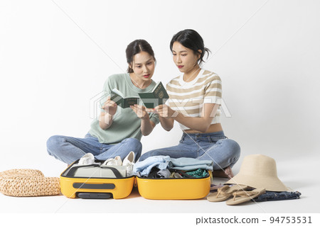 preparing for a summer trip concept series_korean beautiful asian young women passport checking preparing for a summer trip concept series_korean beautiful asian young women passport checking 94753531