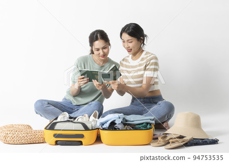 preparing for a summer trip concept series_korean beautiful asian young women passport checking preparing for a summer trip concept series_korean beautiful asian young women passport checking 94753535