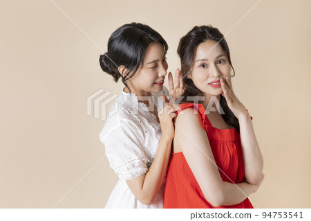 summer vacation trip with friends concept series_korean beautiful asian young women whispering summer vacation trip with friends concept series_korean beautiful asian young women whispering 94753541