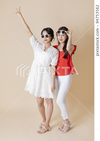 summer vacation trip with friends concept series_korean beautiful asian young women wearing sunglasses having fun time summer vacation trip with friends concept series_korean beautiful asian young women wearing sunglasses having fun time 94753562