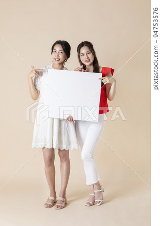 summer vacation trip with friends concept series_korean beautiful asian young women holding panels summer vacation trip with friends concept series_korean beautiful asian young women holding panels 94753576