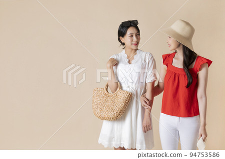 summer vacation trip with friends concept series_korean beautiful asian young women crossing arms summer vacation trip with friends concept series_korean beautiful asian young women crossing arms 94753586