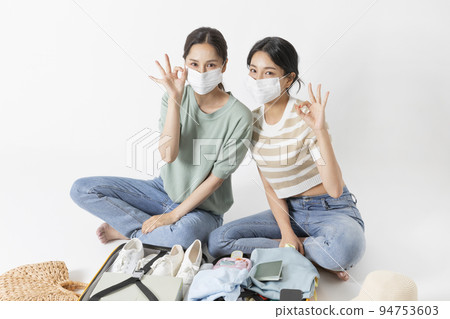 preparing for a summer trip concept series_korean beautiful asian young women wearing mask preparing for a summer trip concept series_korean beautiful asian young women wearing mask 94753603