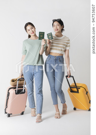 preparing for a summer trip concept series_korean beautiful asian young women holding passport preparing for a summer trip concept series_korean beautiful asian young women holding passport 94753607