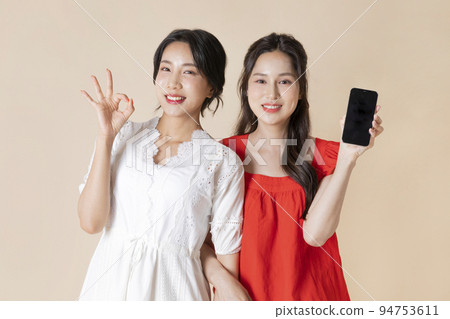 summer vacation trip with friends concept series_korean beautiful asian young women with hand motions summer vacation trip with friends concept series_korean beautiful asian young women with hand motions 94753611