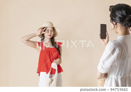 summer vacation trip with friends concept series_korean beautiful asian young women taking a photo summer vacation trip with friends concept series_korean beautiful asian young women taking a photo 94753682